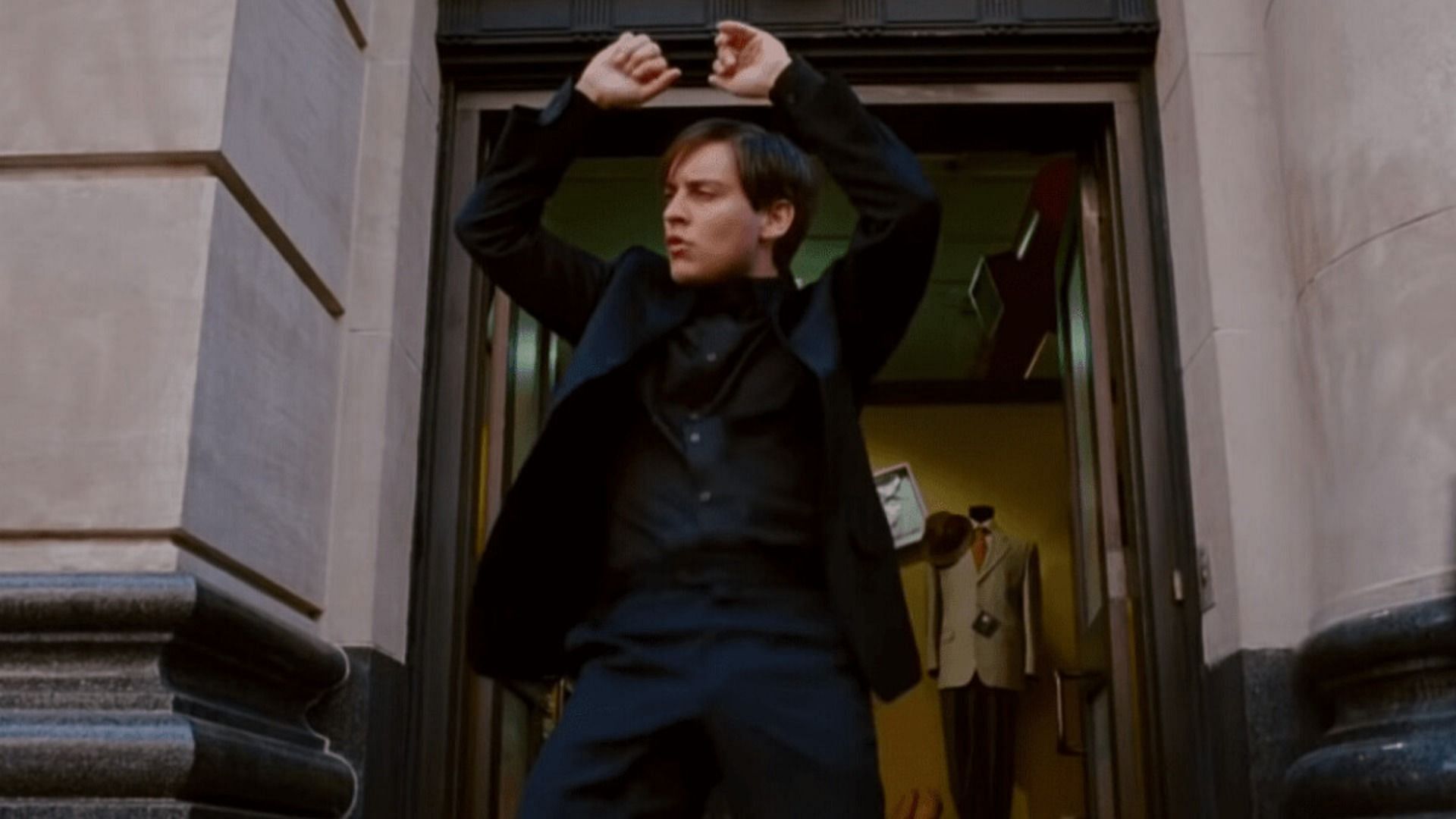 Tobey Maguire's Peter Parker gets caught in the moment and shows off his moves in the iconic dance scene (Image via Sony)